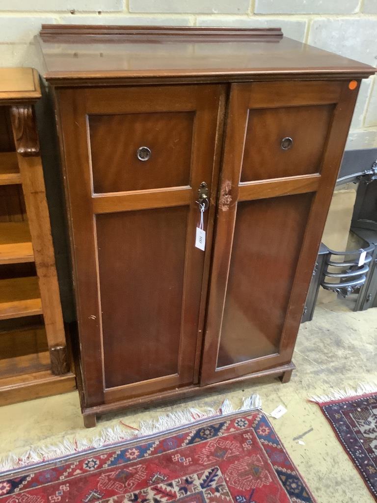 An Edwardian mahogany two door compactum